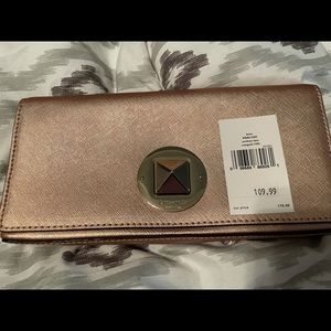 Kate spade rose gold clutch